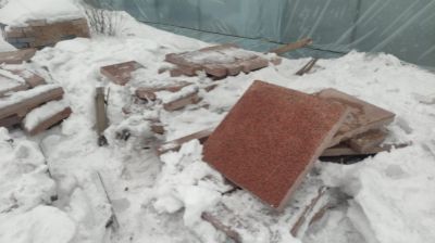 Товарно-материальные ценности: Плиты гранитные (около 50 кв. м.).